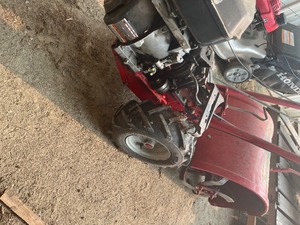 lot 17 image: troy built rear tine tiller needs repair