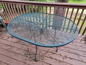 lot 57 image: Vintage Wrought Iron Oval Patio Table