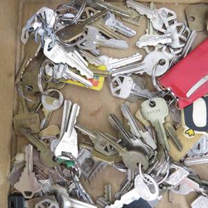 lot 92 image: Vintage Keys, Keychains, Skeleton, Wooden Nickels & More