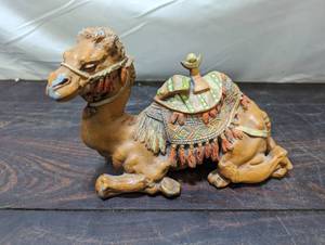 lot 20 image: Metal Camel Candleholder