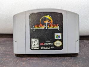 lot 6 image: Mortal Kombat 4 Nintendo 64 Game Cartridge