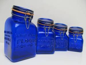 lot 78 image: Set of Vintage Embossed Cobalt Blue Glass Kitchen Canister Jars