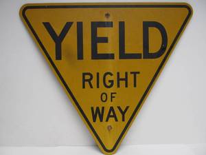 lot 147 image: Older Vintage YIELD Right of Way Black on Yellow Street Sign