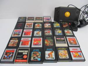 lot 166 image: Group of ATARI 2600 Video Games & Controllers