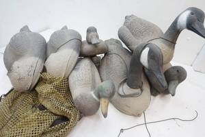 lot 23 image: Plastic decoys, weights.