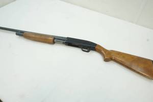 lot 27 image: Mossberg 12 ga. gun