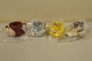 lot 191 image: 4 Vintage Looney Tunes 3D Face Mugs -Taz, Bugs, Tweety, Wile E Coyote