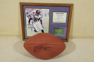 lot 204 image: Randy Moss Framed Photograph with Signed Football