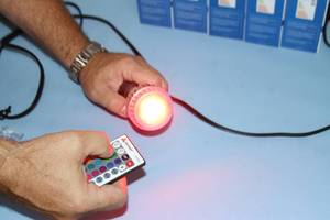 lot 38 image: Lot of 5 - Warmoon RGB LED Multi-Color Light Bulbs with Remote Controls