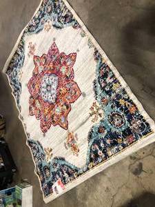 lot 23 image: StyleWell Aurora Multicolored 6 ft. x 9 ft. Medallion Area Rug Customer Returns See Picture