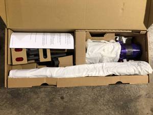 lot 26 image: Dyson V10 Animal Cordless Stick Vacuum Customer Returns See Picture