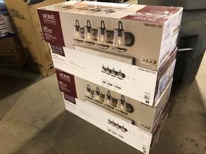 lot 49 image: Lot of 4  Home Decorators Collection Georgina 30 in. 4-light Weathered Iron Industrial indoor vanity with Clear Seeded Glass Shades   Customer Returns See Picture