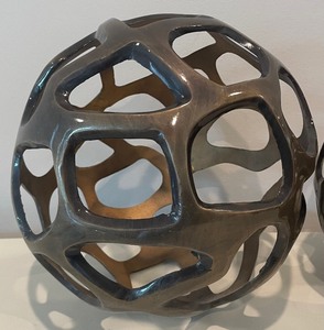 lot 39 image: Two Decorative Sphere Figurines