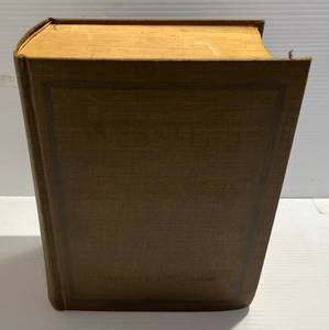 lot 110 image: 1958 Webster Dictionary (Slight Smell)