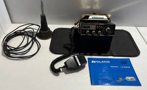 lot 125 image: Midland Model 13-882B CB Radio With Hinged Auto Floor Mount
