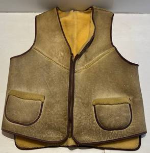 lot 148 image: Vintage Sheep Skin Cowboy Vest Size Med. (Small Tear At Top Center Back)