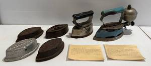 lot 266 image: Group Of Vintage Sad Irons And More Including Coleman And Provenance