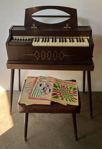 lot 303 image: 1950s Magnus Organ Corporation Electric Cord Organ With Stand, Bench And Sheet Music (Works)