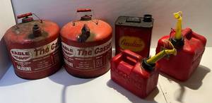 lot 38 image: Misc. Size Gas Cans & More