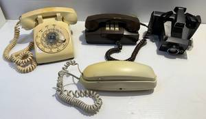lot 99 image: Polaroid Memory Maker Camera And Vintage Phones