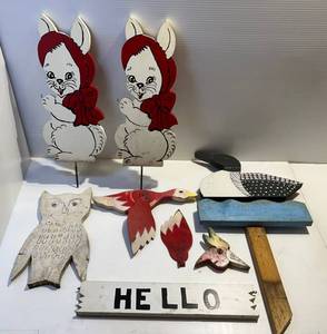 lot 249 image: Wooden Lawn Ornaments