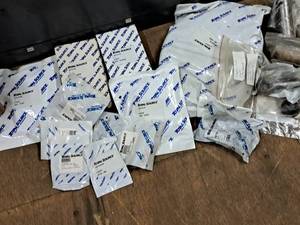 Lot of (1 Box) Hoses, Bushings, Caps, Battery Cap Kit, Covers, hardware