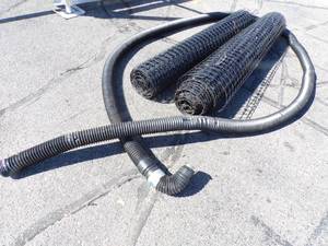 lot 70 image: 2 Rolls of Plastic Fencing and 3 Drain hose
