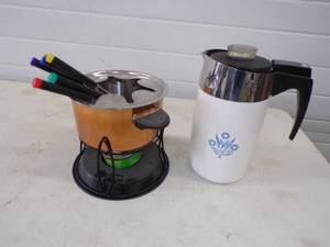 lot 25 image: Mid Century Modern Fondue Pot with Sticks and Vintage Corningware Coffee Pot