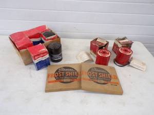 lot 27 image: Antique Auto Parts 2 Rare Stearns Frost Sheilds, 2 Firestone and 6 Marine Oil Filters