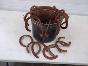 lot 49 image: Large Bucket of Vintage Horse Shoes