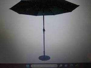 lot 69 image: Sun-Ray 9 Solar-Lighted Market Umb...