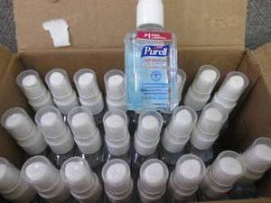 lot 97 image: Box of 24- 2 oz Purell Hand Sanitiz...