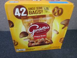 lot 375 image: Case of 42 pks Gardettos- damaged o...