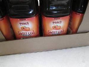 lot 194 image: 8- 64 oz Bottles Peach Sweet Leaf T...