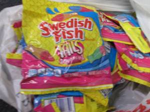 lot 228 image: 12- 3.6 oz bags Swedish Fish Tails...