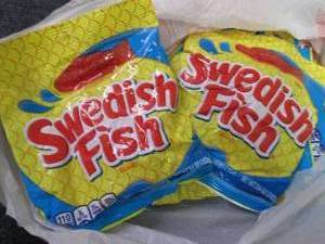 lot 229 image: 12- 3.6 oz bags Swedish Fish ...