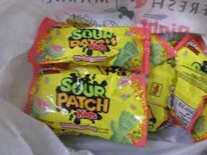 lot 230 image: 12- 2 oz Sour Patch Kids Watermelon...