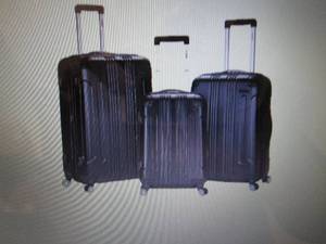lot 25 image: Rockland 3-pc. Sonic Hardside Spinn...