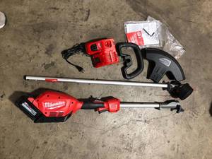 Milwaukee M18 FUEL 18V Lithium-Ion Brushless Cordless String Trimmer with QUIK-LOK Attachment Capability and 8.0 Ah Battery Customer Returns See Picture
