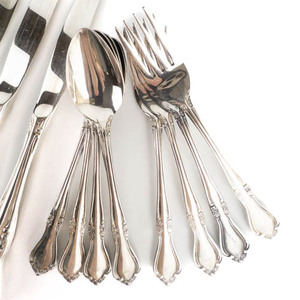 lot 126 image: 4 place setting Breton Rose Flatware with Salad Tongs 17 pieces total stainless steel.