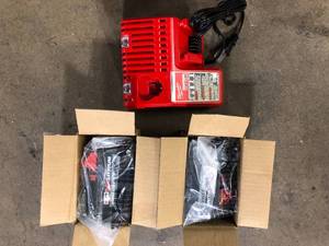 Milwaukee M18 18-Volt Lithium-Ion High Output Starter Kit with Two 6.0 Ah Battery and Charger Customer Returns See Pictures