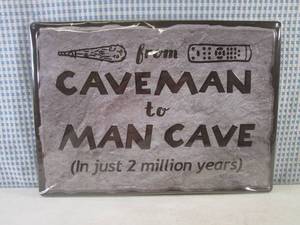 lot 38 image: (G-1) Metal Sign From Caveman To M...