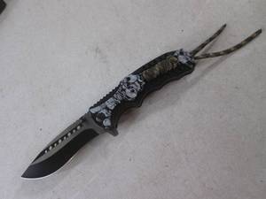 lot 57 image: (CNTR) Skulls Design Spring Assist ...