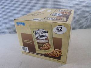 lot 64 image: (C-1) Case 42 Pouches Famous Amos C...