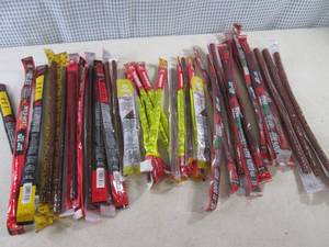 lot 98 image: (B-1) 36 Assorted Smoked Snack Stic...
