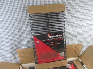lot 131 image: (EC1) Case of 8 Grill Parts Pro Adj...