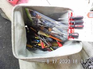 lot 36 image: Large collapsible storage with a HUGE variety of size, style and brands of screwdrivers.