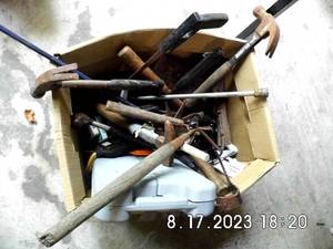 lot 41 image: Box of Assorted style hammers, saws, and other cutting tools along with household tool kit