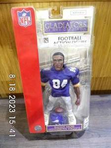 lot 64 image: Football Action Figure