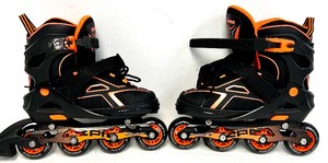 lot 57 image: ZPM SPORTS Rollerblades US size 1-4 & GIRO XS Helmet
